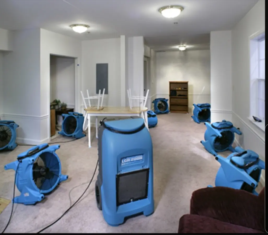 Air movers and dehumidifier setup for Water Damage Restoration in Woodcrest